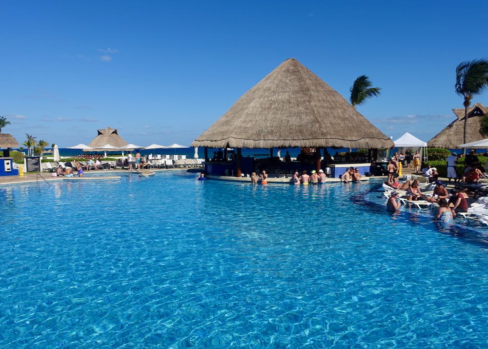 Playa del Carmen resort with swim-up bar and nightlife. 