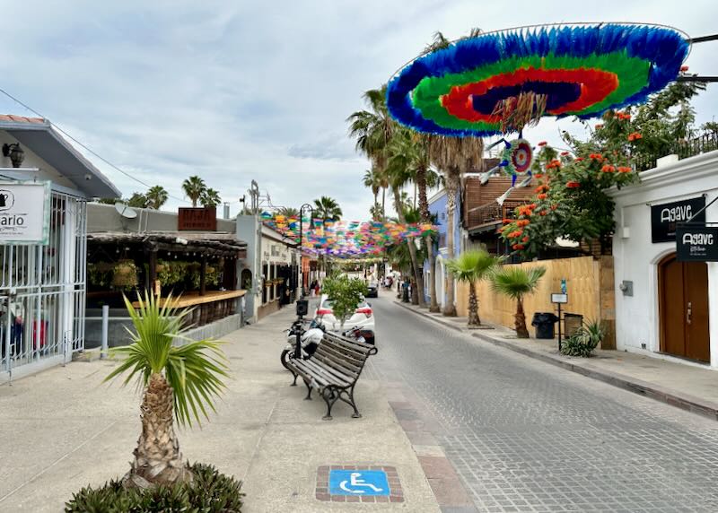 A stone street with an art sculpture.