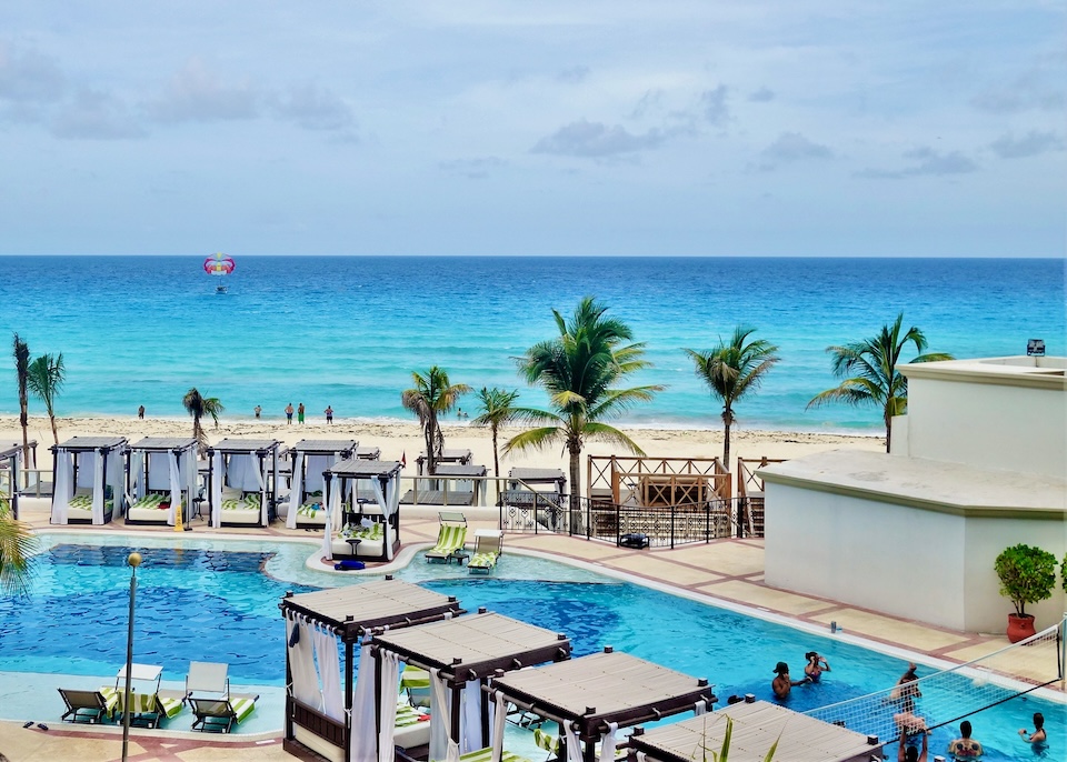 A freeform infinity pool on the beach at Hyatt Zilara in Cancun.